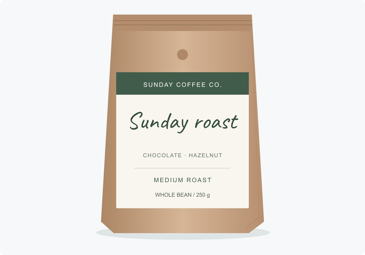 Coffee bag mockup with Sunday roast in Caveat on a white label above the product weight